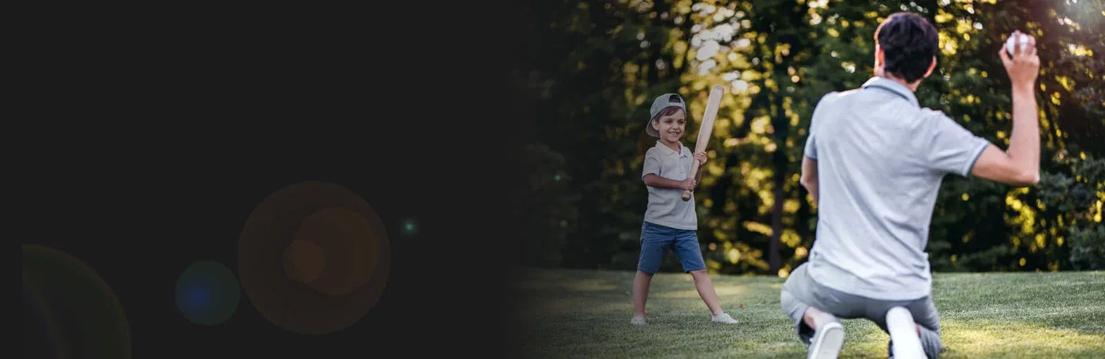 man playing catch with child